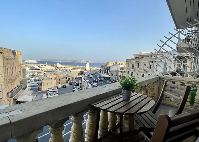 Seafront With Balcony Overlooking Marina *